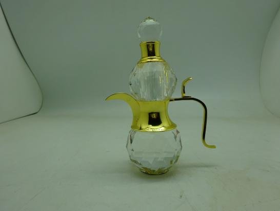 زجاجة عطر على شكل دله
